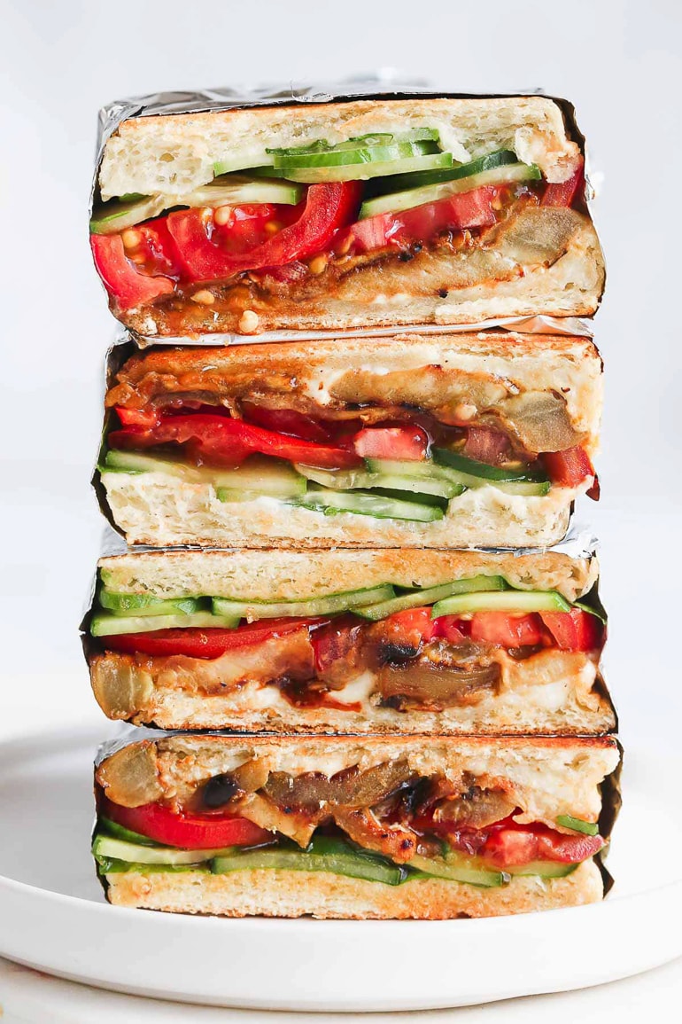 stacked sandwiches with cucumber, tomato and eggplant
